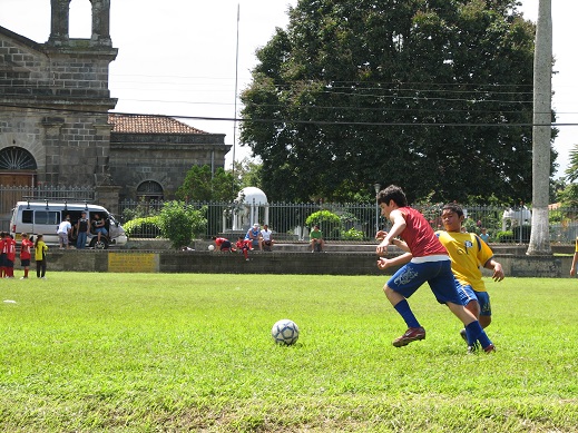 children playing futbol, costa rica, copyright athena rayne anderson